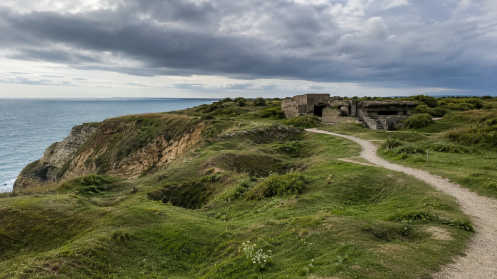 Shell craters and ruined gun emplacement at Pointe du Hoc on the Normandy clifftops